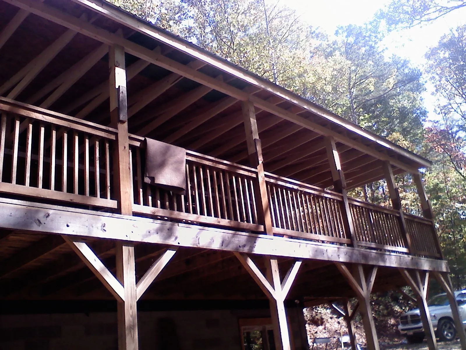 Timber framing under a new elevated porch and deck — Roof Leak Repair in Wamego by Roofing Brothers